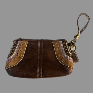 Embroidered Coach wristlet - very good condition